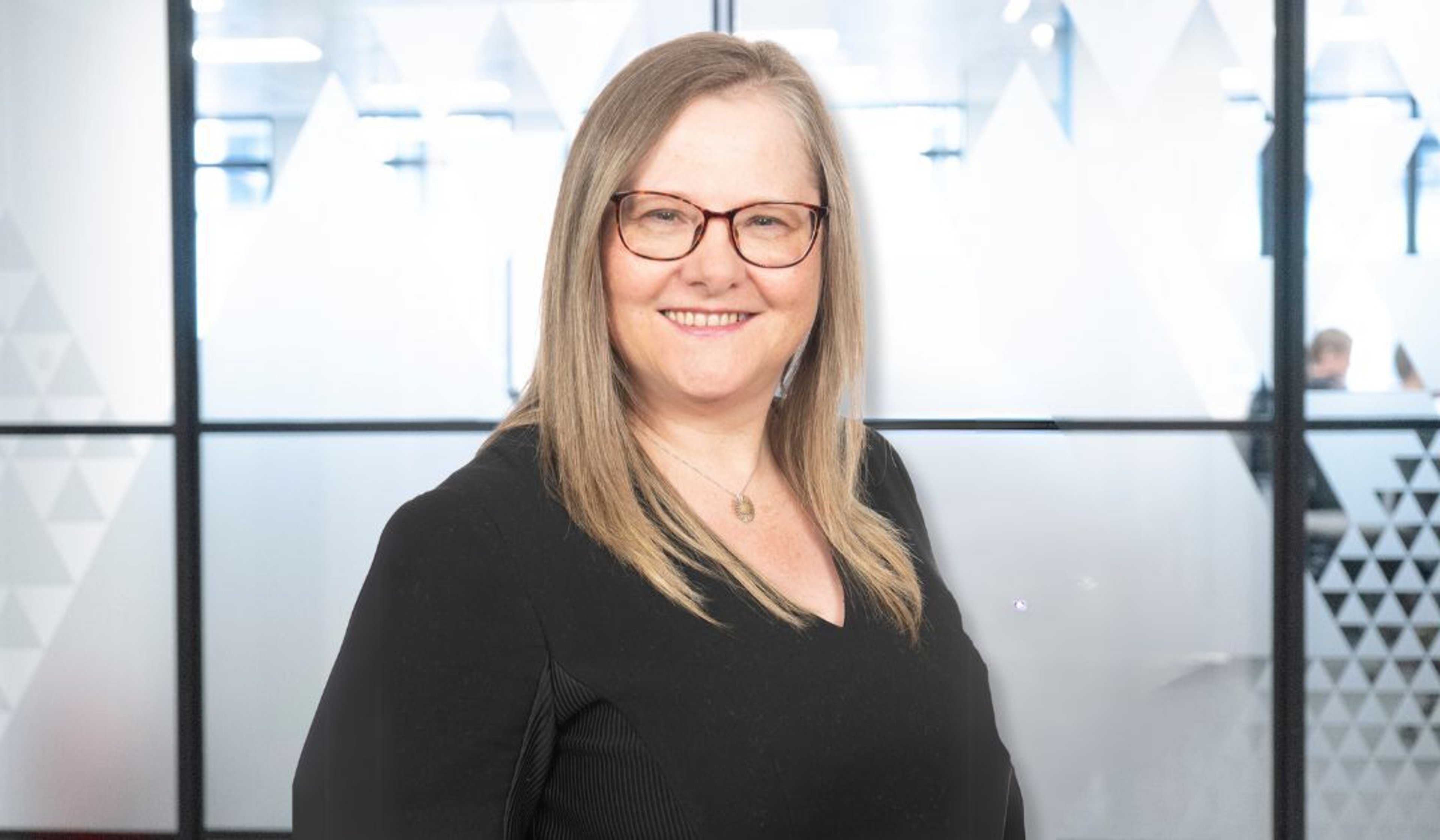 A headshot of Alison Whalley
